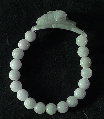 Bracelet en pierre de jade. Dragon et 18 boules de jade. Jade-France