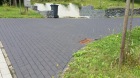 Stützmauer aus Mauerscheiben und Gabionen, Einfahrt aus Pflasterklinker Stützmauer aus Mauerscheiben und Gabionen, Einfahrt aus Pflasterklinker