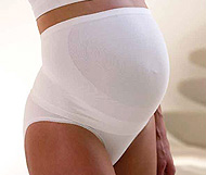 Bauchst�tze wei� und schwarz, � Medela AG, Switzerland.
