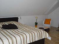 Gästezimmer "Erde" mit Balkonzugang