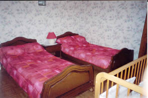Chambre avec 2 lits d'une personne dans gite les attelages du pays d'ouche