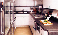 Fully equipped galley and separate stewardess pantry.