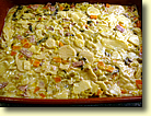 Gem&uuml;se mit Saucisson zum Gratin beigeben und gut mischen
