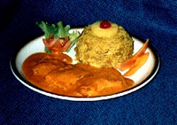Red Snapper Fischfilet an Kreolischer Cognacsauce und Calypsoreis