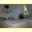 Erholungsurlaub im Ferienhaus "Cornelis" f�r bis zu 10 Personen an der Nordsee. Hier mit Blick ins Schlafzimmer