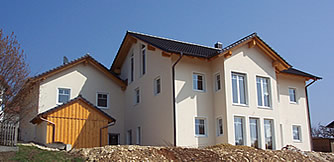 Wohnhaus mit Garage und Holzlege, fertiggestellt