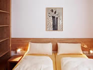 Schlafzimmer in der 14er Ferienwohnung