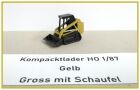 Kompacktlader Gelb gross mit Schaufel