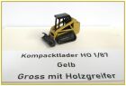 Kompacktlader Gelb gross mit Holzgreiffer