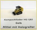 Kompacktlader Gelb mittel mit Holzgreiffer