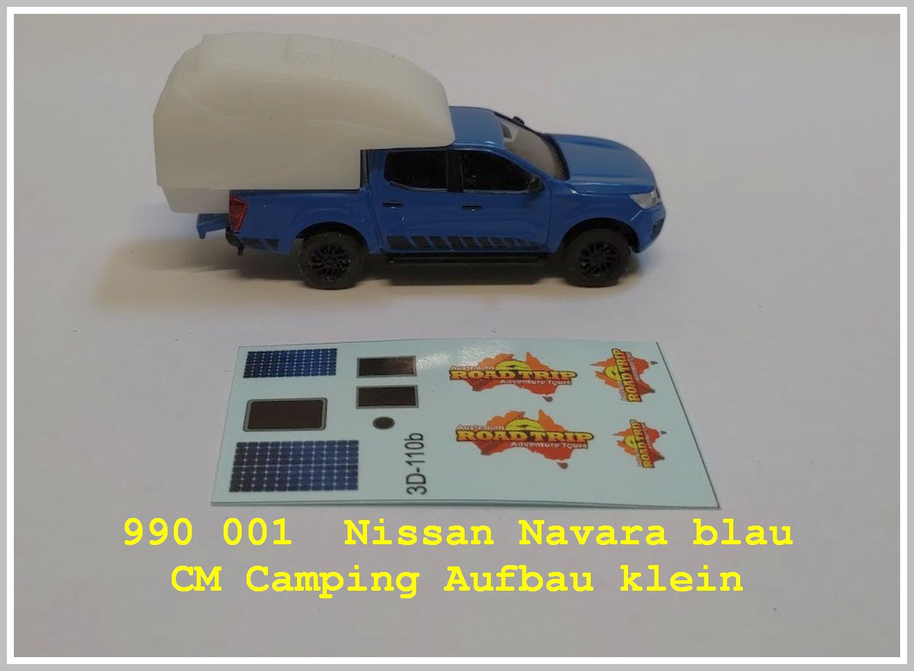 Nissan Navara blau mit  Camper Aufbau Klein